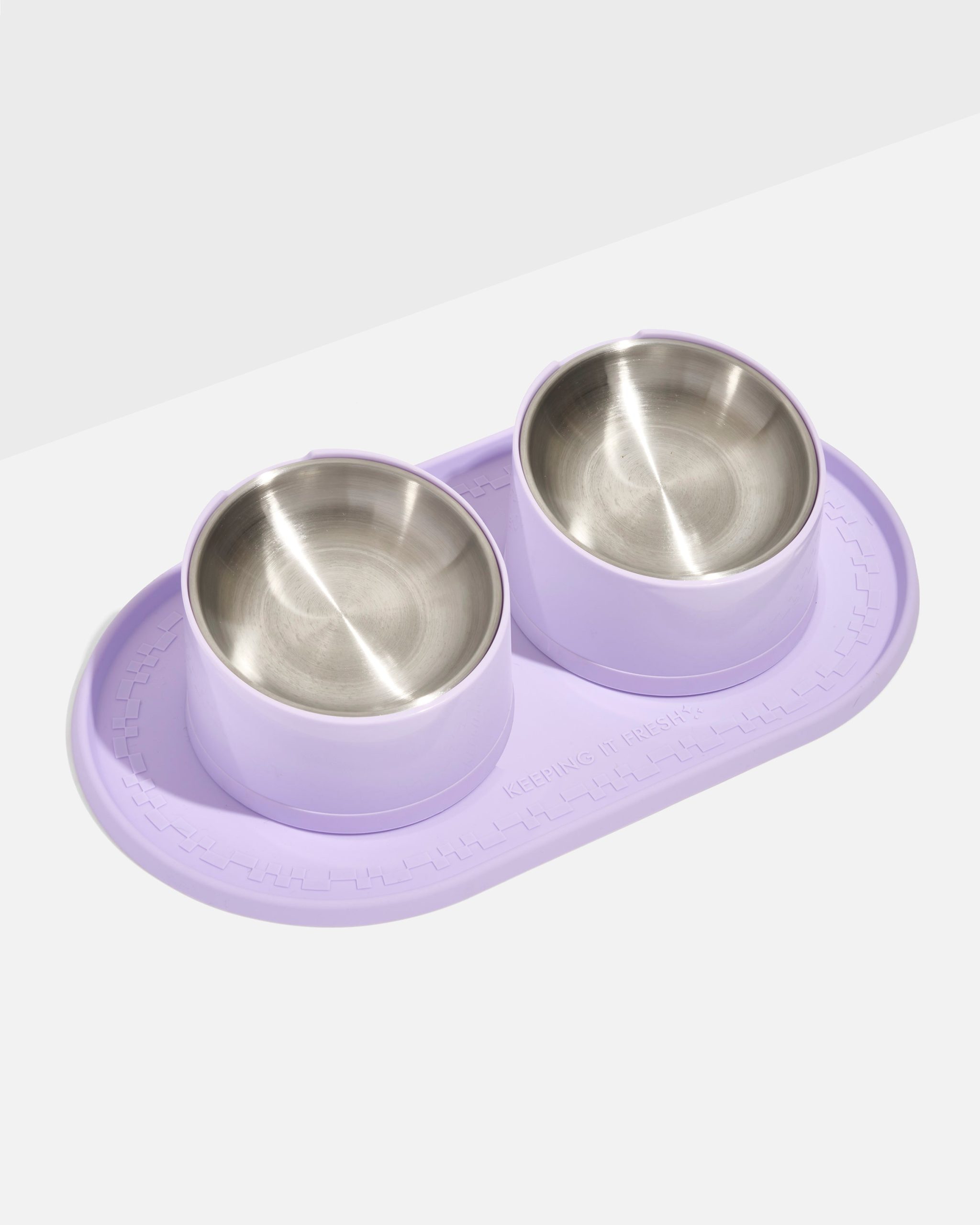 WO_VM_Cat_Placemat_SlantedBowl_Lilac_PDP_01_COMP_4x5_Web_b300c28a-b733-4e96-a938-aeac91d2e4b1.jpg